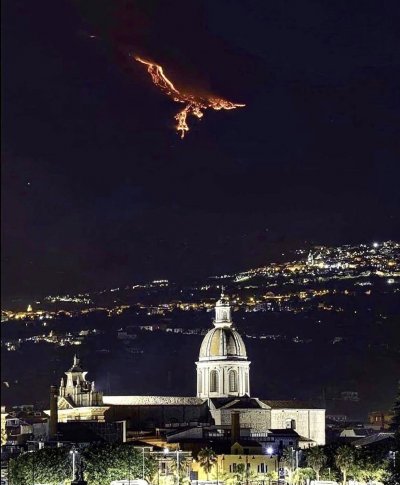 Eruption from Mount Etna (Sicily) gives the illusion of a Phoenix in the sky. .jpeg