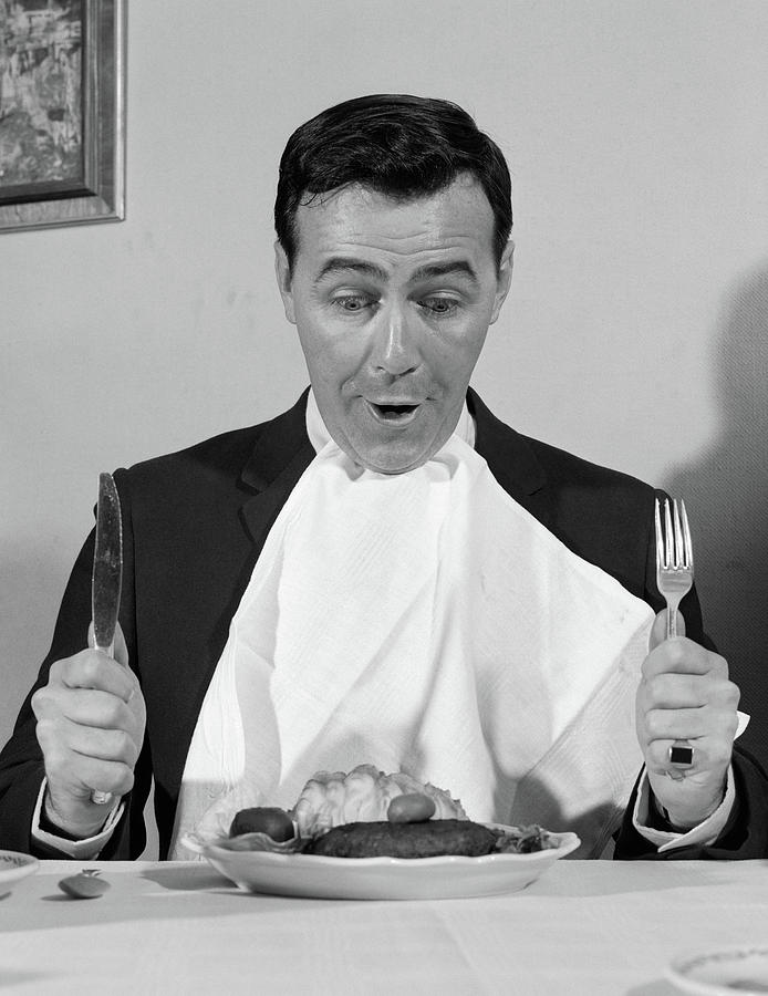 1960s-man-sitting-at-table-ready-to-eat-vintage-images.jpg