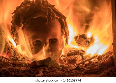 burning-doll-head-fire-halloween-260nw-1416159974.png